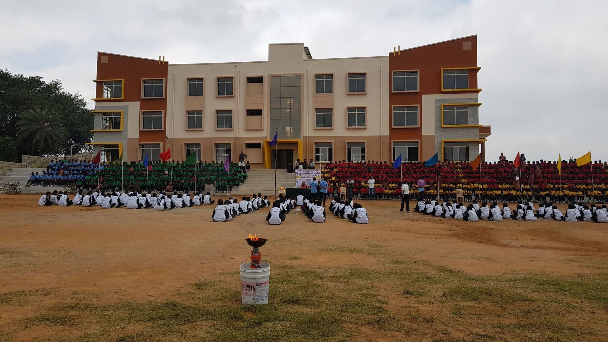 Students at the annual sports meet in front of the school building